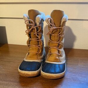 Sorel Tan and Black Winter Boots